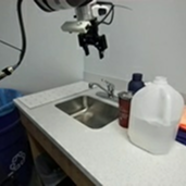 Task video frame 5 of the robot moving the sink faucet